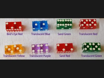 Numbered regulation casino dice in multiple colors